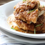 Crispy honey garlic chicken is a fast fix for dinner for two with a double battered spice mix served with honey garlic sauce.