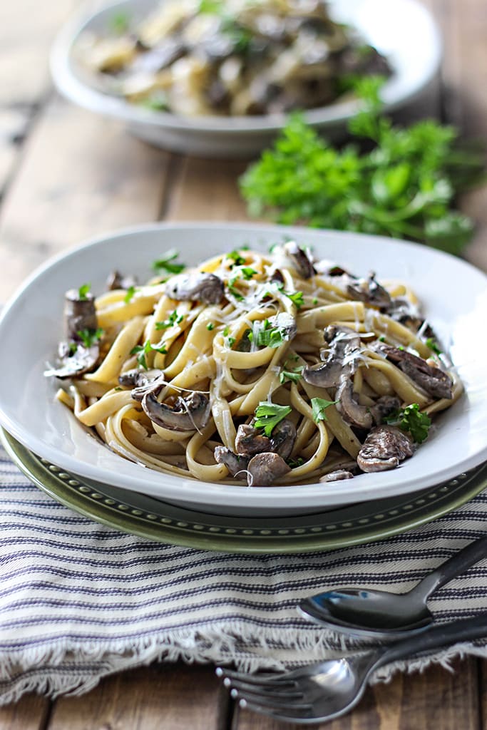 Hearty, earthy and meaty. This creamy mushroom Alfredo is a great dinner for two for pasta lovers.