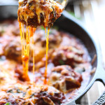 This cheesy meatball skillet has so many ways to be enjoyed! Pop them in a sub or mix them with pasta, or have them with some bread!
