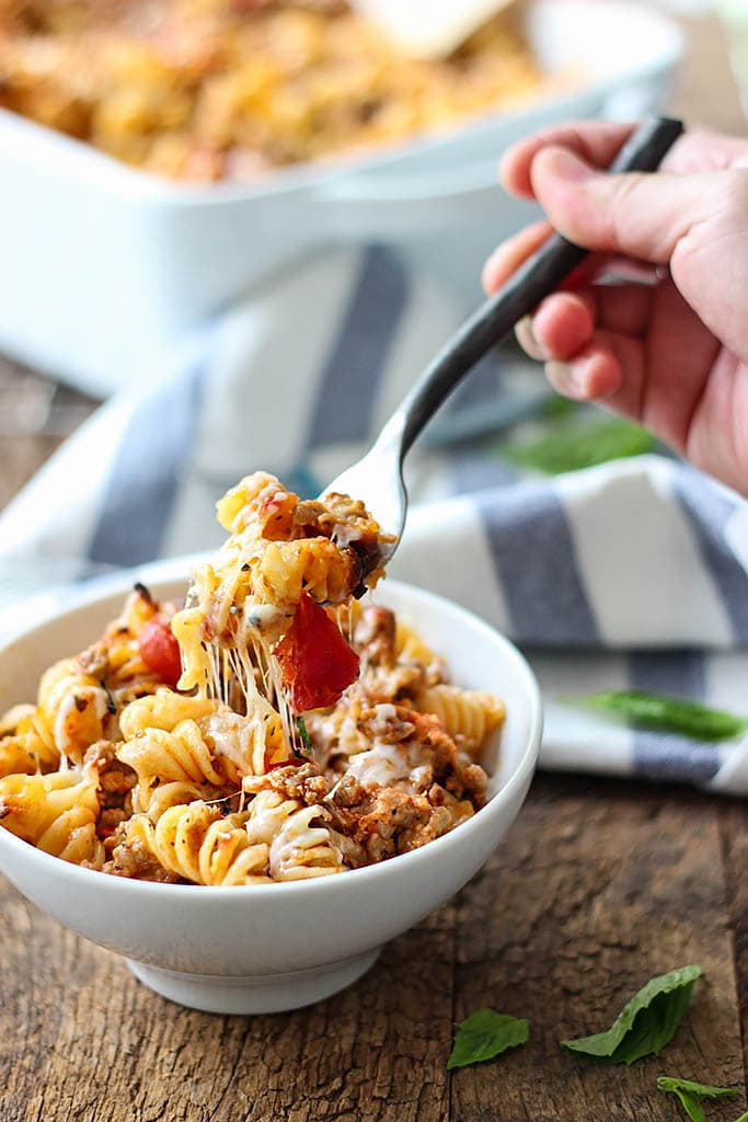 A cheesy hot Italian pasta bake with a spiced savory and sweet marinara sauce, hot Italian flavors and plenty of cheese.